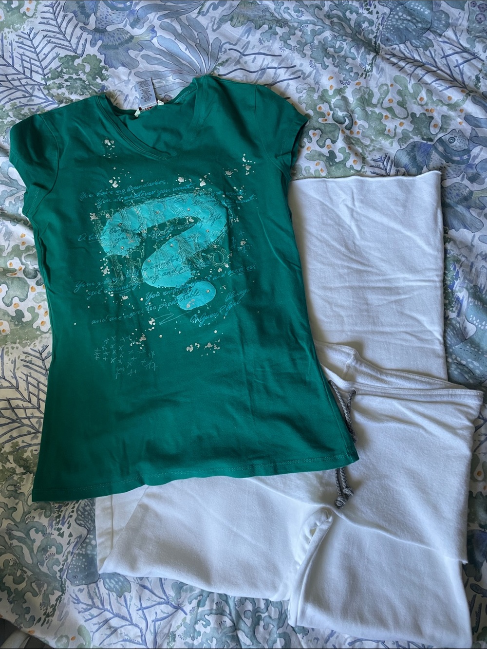 Retro 90’Guess Jeans Women's Teal V‑Neck Graphic Tee with sequins and embroidery